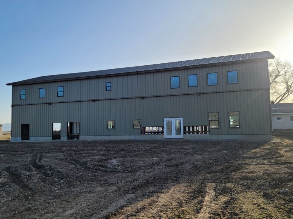 Two-story pre-engineered residential steel home built in Cache Valley Utah